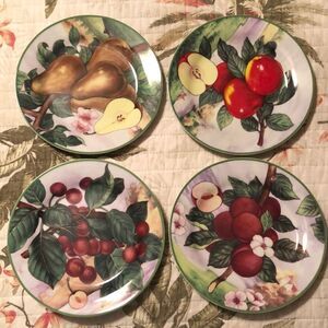 Set of four porcelain dessert plates